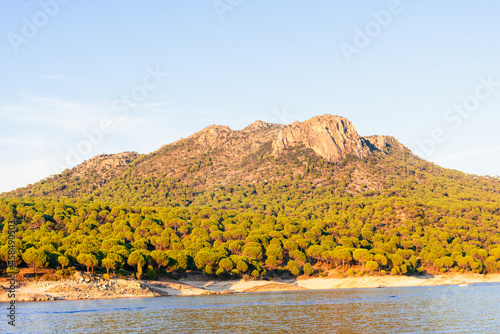 calm, peace and quiet in san juan reservoir in madrid during sunset in autumn