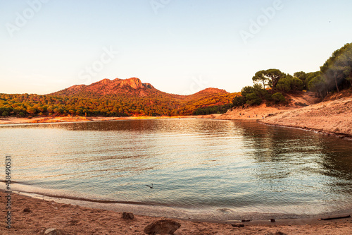 calm, peace and quiet in san juan reservoir in madrid during sunset in autumn