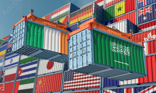 Freight containers with Saudi Arabia and Ireland national flags. 3D Rendering © Marius Faust