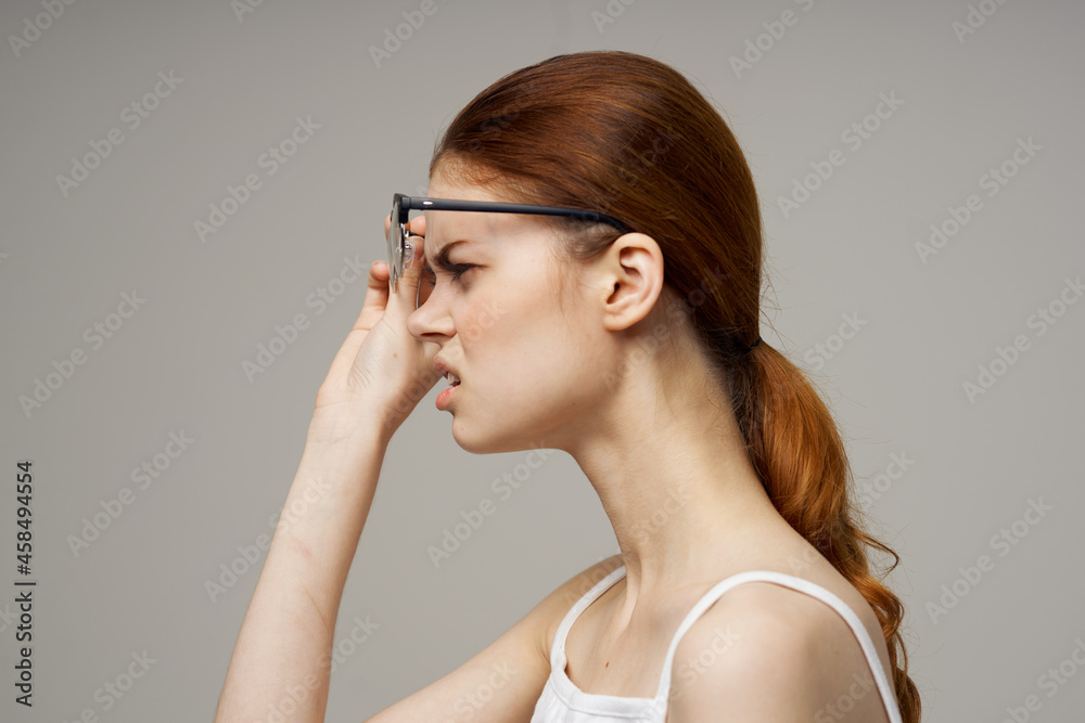 woman in white t-shirt vision problems myopia light background woman in white t-shirt vision problems myopia light background