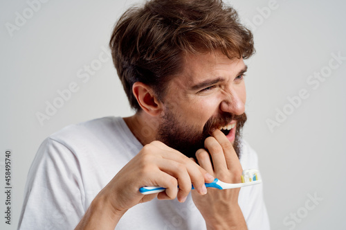 man hygiene toothpaste morning isolated background