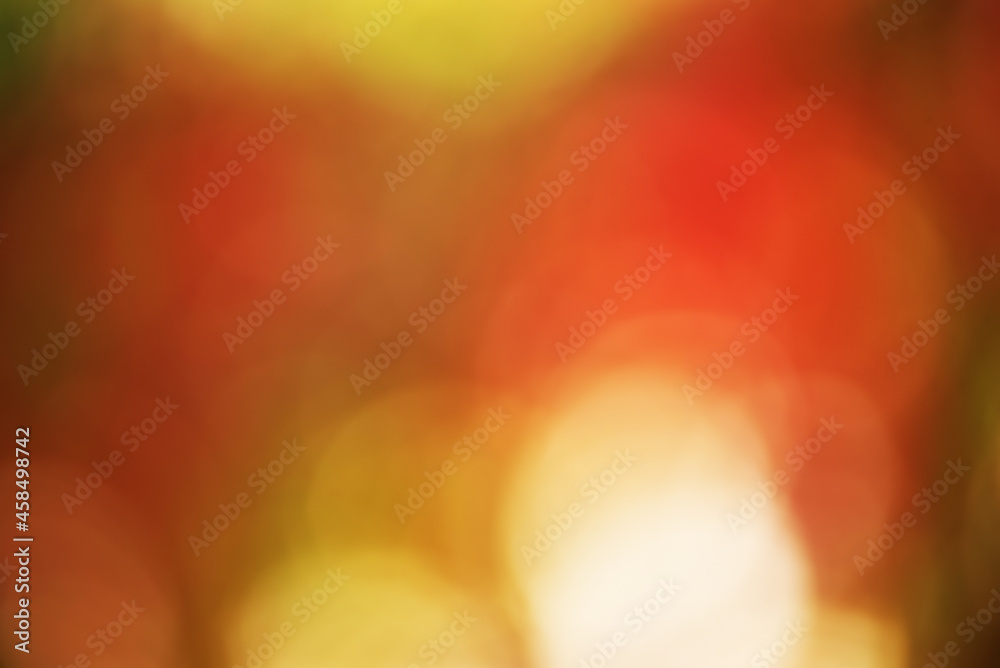 Defocus light autumn background. Defocused beautiful bokeh with autumnal red and yellow leaves. Defocus light autumn background. Defocused beautiful bokeh with autumnal red and yellow leaves.