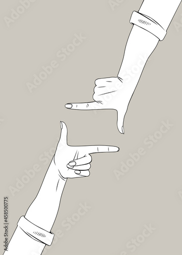 Female hands depict a frame of thumbs and forefingers