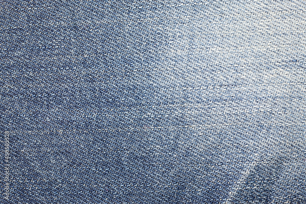 Naklejka premium Blue jeans texture background.