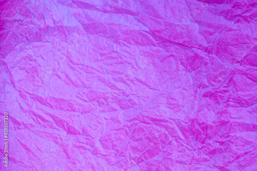Crumpled vintage Purple paper textured obsolete background.