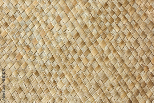 Woven palm mat texture may used as background natural fiber handmade sheet woven bast basket 