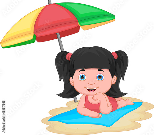 little girl sunbathing on the beach