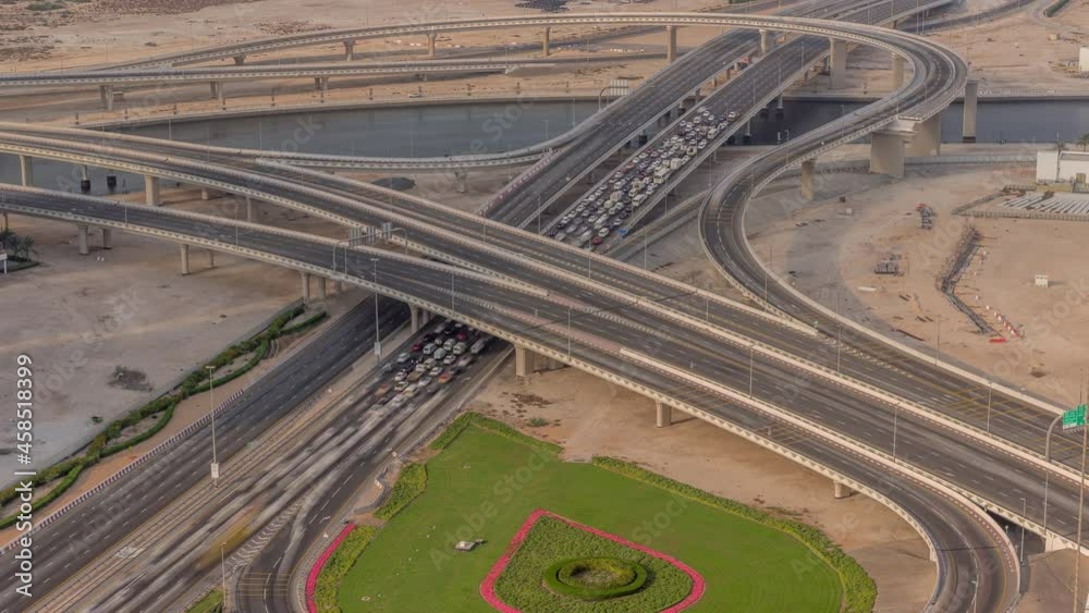 Top view city traffic on a big crossroad in Business bay timelapse. Top view city traffic on a big crossroad in Business bay timelapse.