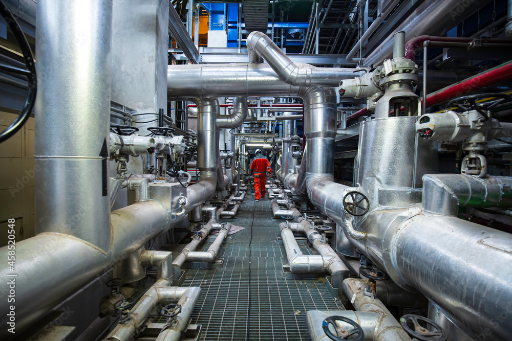Male to be worker visual inspection inside control room Male to be worker visual inspection inside control room