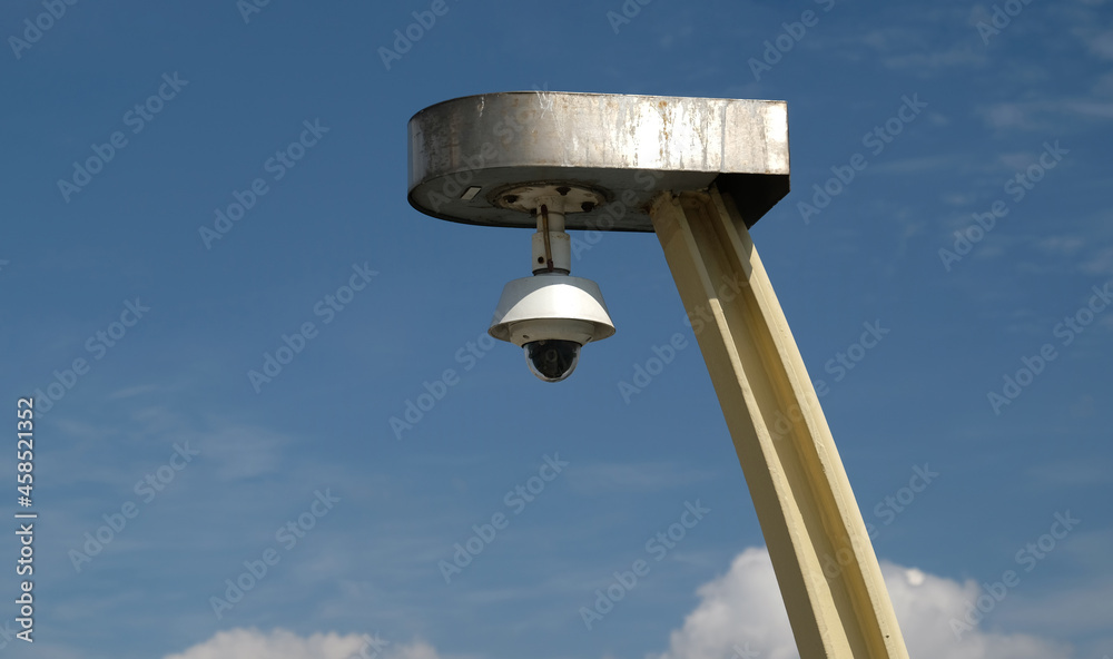 Real time Modern Online Security Panoramic CCTV camera surveillance system. An outdoor video surveillance ip-camera is installed on a metal post. Equipment system service for safety life or asset. Real time Modern Online Security Panoramic CCTV camera surveillance system. An outdoor video surveillance ip-camera is installed on a metal post. Equipment system service for safety life or asset.