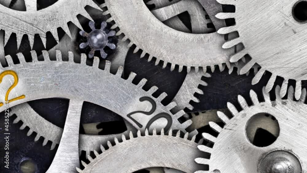 Rotating tooth wheel with New Year 2022 and group of wheels going from 2016 to 2021. High quality 4k video.