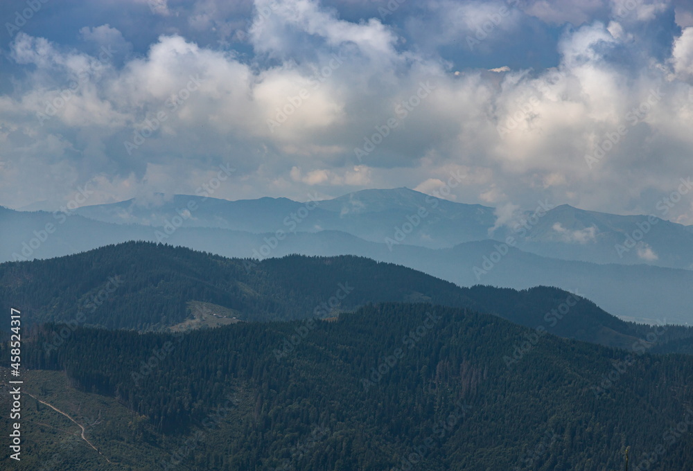 mountain slopes in the Ukrainian Carpathians. mountain tops and forests on a background of blue sky