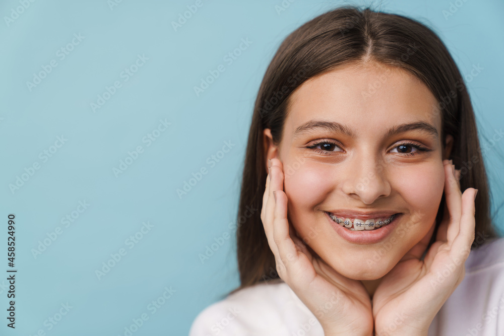 Young white brunette woman smiling and looking at camera Young white brunette woman smiling and looking at camera