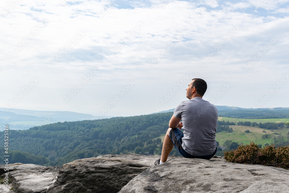 Tisa Rocks czech republic mountain formation sandstone walls male man sit look Tisa Rocks czech republic mountain formation sandstone walls male man sit look