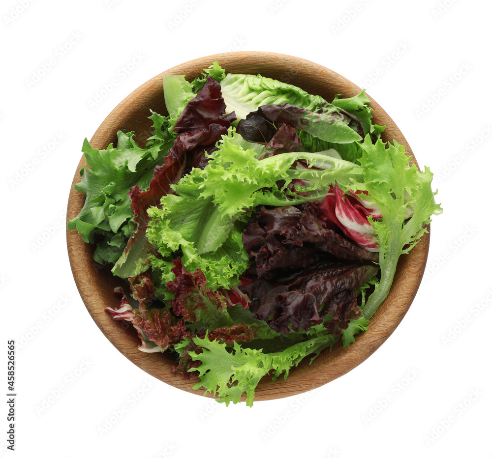 Wooden bowl with leaves of different lettuce on white background, top view Wooden bowl with leaves of different lettuce on white background, top view