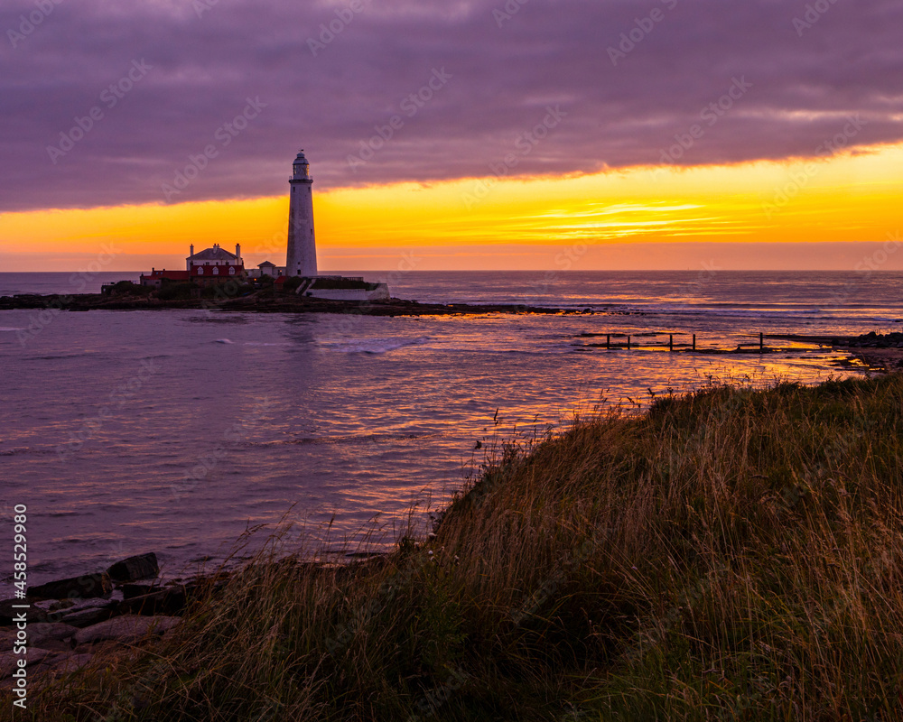 Sunrise at St. Marys Lighthouse in Northumberland, UK