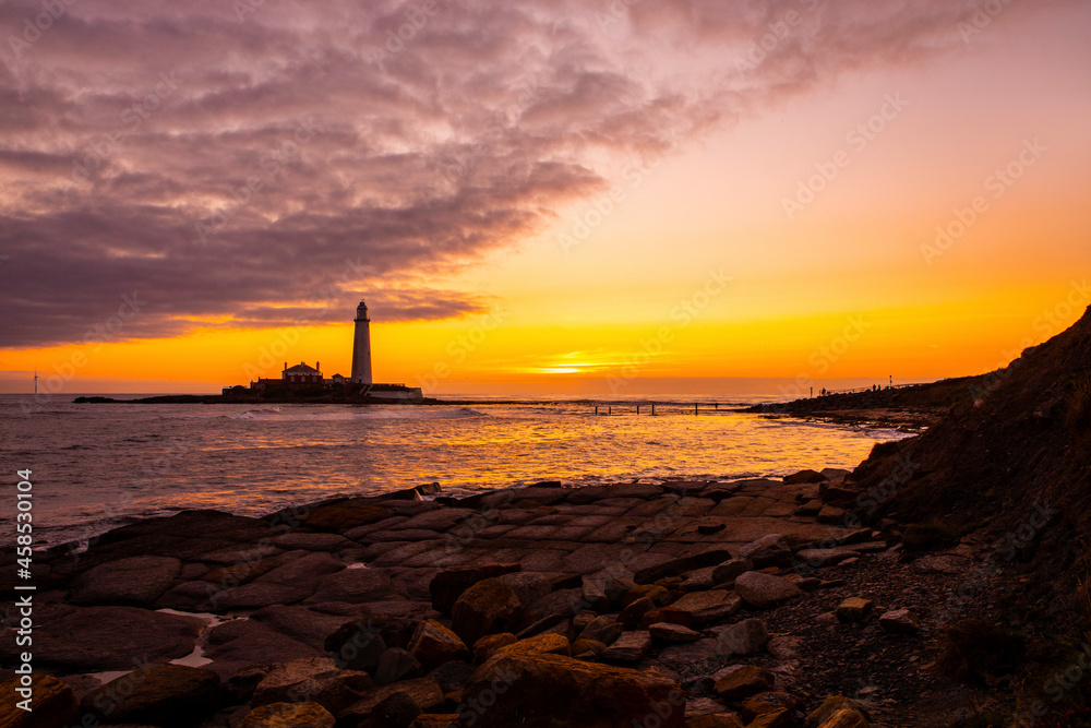 Sunrise at St. Marys Lighthouse in Northumberland, UK Sunrise at St. Marys Lighthouse in Northumberland, UK