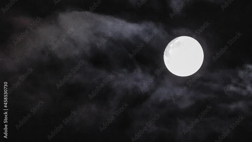 Timelapse fof full moon with clouds on black sky Timelapse fof full moon with clouds on black sky