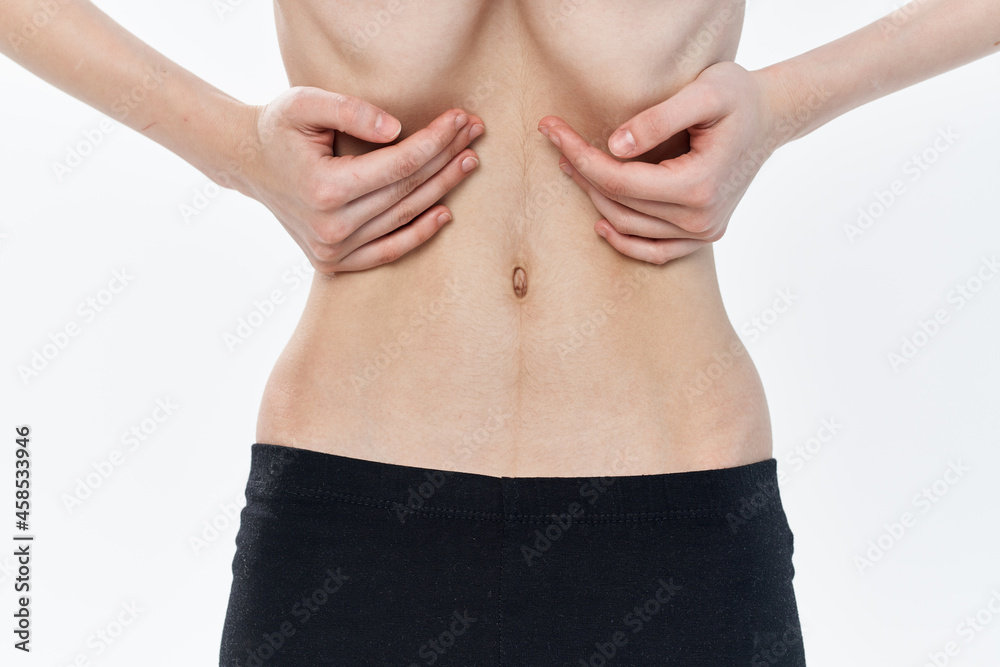 woman pulls in belly slim waist slimming diet woman pulls in belly slim waist slimming diet