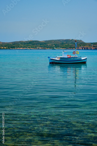 Greek fishing boat in Aegean sea near Milos island, Greece © Dmitry Rukhlenko