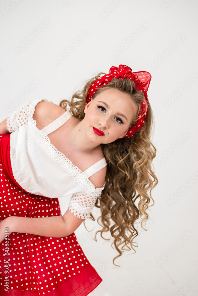 curly girl in a red polka dot skirt curly girl in a red polka dot skirt