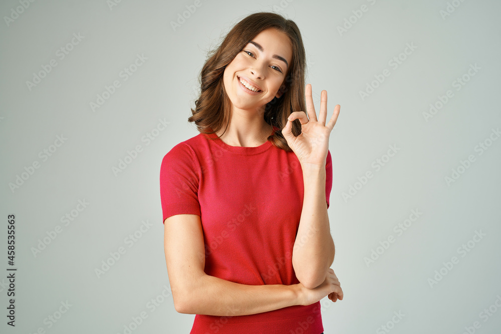 cheerful woman holding on to hair cosmetics Studio Lifestyle cheerful woman holding on to hair cosmetics Studio Lifestyle