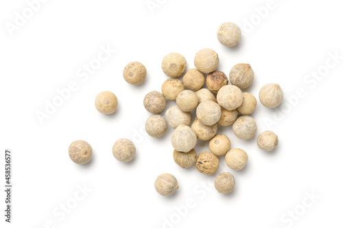 Flat lay  Top view  pile of white peppercorns  white pepper  isolated on white background.