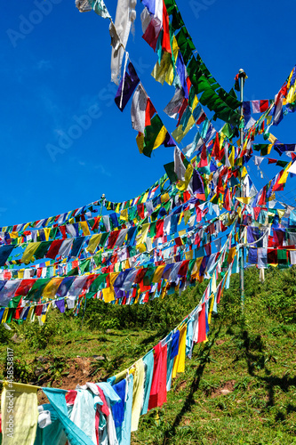 Buddhist prayer flags lunga in McLeod Ganj, Himachal Pradesh, India photo