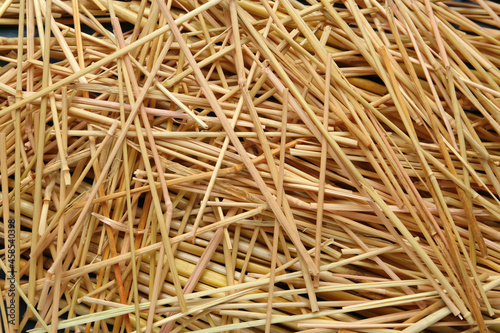Heap of dried hay as background, top view