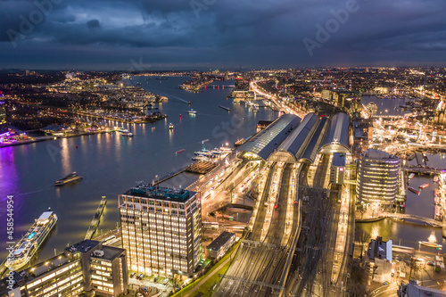 Amsterdam Centraal Train Station at Night Aerial View photo