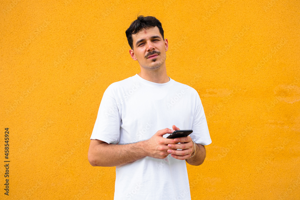 Portrait of handsome man using his mobile Portrait of handsome man using his mobile