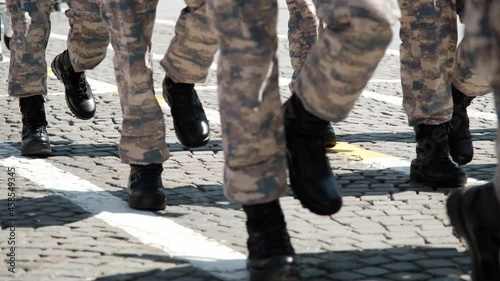 Izmir, Turkey - August 30, 2021: Close up shot of Boots of Turkish soldiers Military walking on Republic Day of Turkey.
 photo