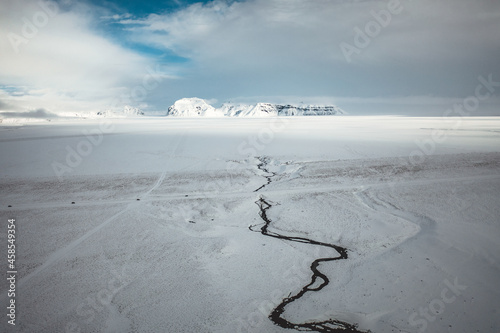 Snowy River in Iceland with Mountains