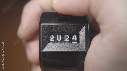 Number on a tally counter increased from 2020 to 2030 photo