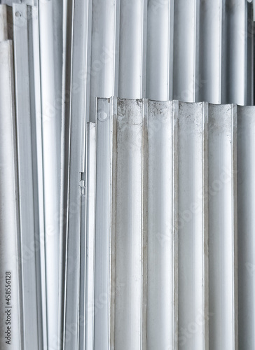 Old corrugated aluminum sheet for interior and exterior applications.