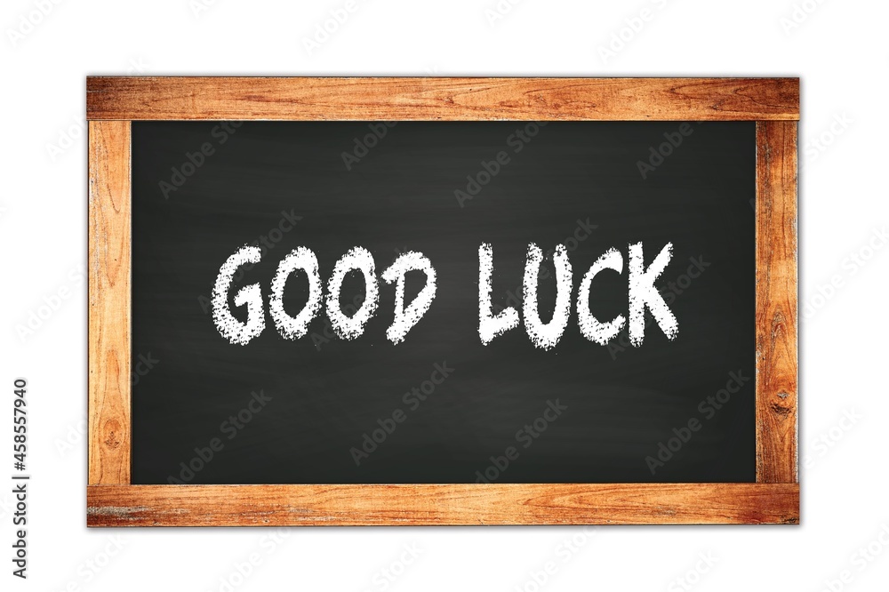 GOOD LUCK text written on wooden frame school blackboard. GOOD LUCK text written on wooden frame school blackboard.