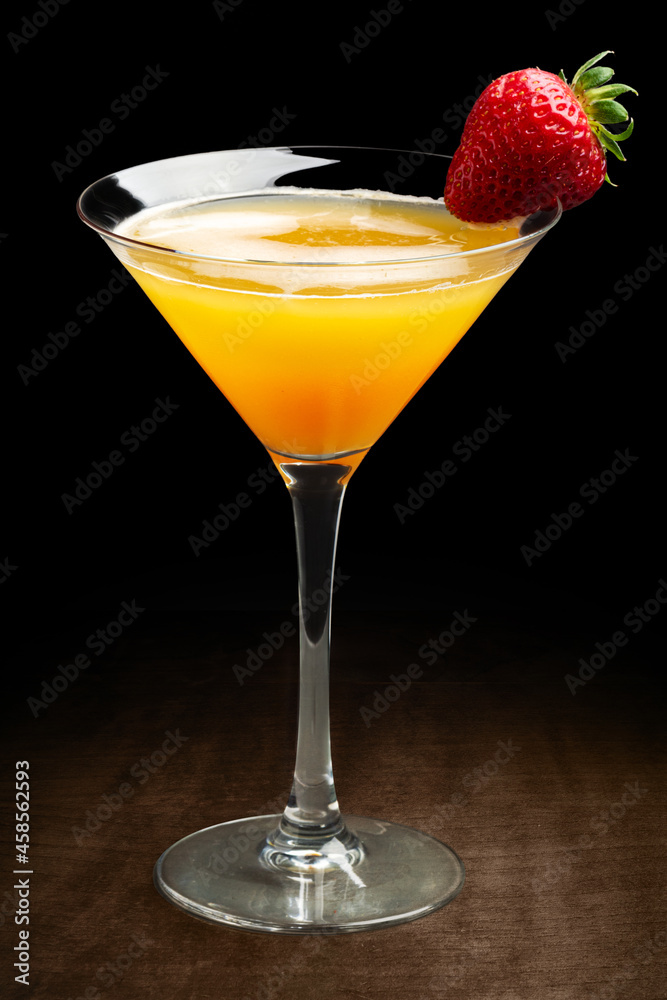 Appetizing daiquiri cocktail drink against black background.