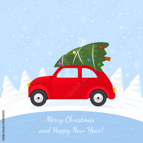 small car on the roof carrying a festive tree for Christmas and New Year's drive home in the winter nature of the forest.