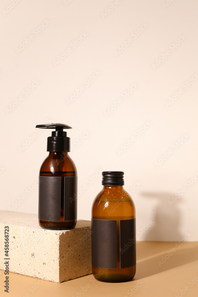 Amber glass dispenser bottle, sprayer and moisturizer cream jar. Natural cosmetic products packaging design template, branding Amber glass dispenser bottle, sprayer and moisturizer cream jar. Natural cosmetic products packaging design template, branding