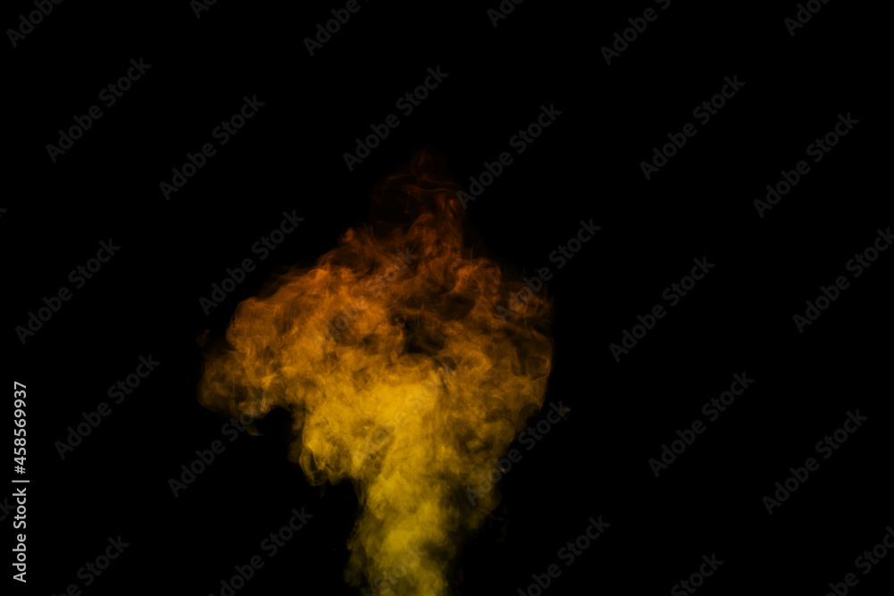 Colored yellow steam, smoke on a black background to superimpose on your photos. Create mystical Halloween