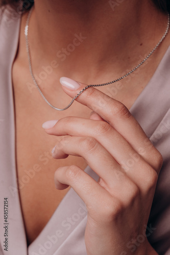 women's hands gold chain advertising jewelry jewelry