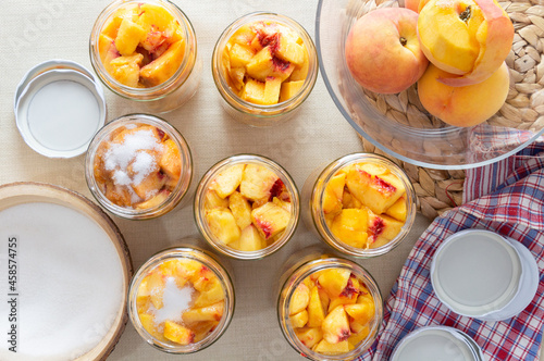 making peach jam on the table, making peach compote