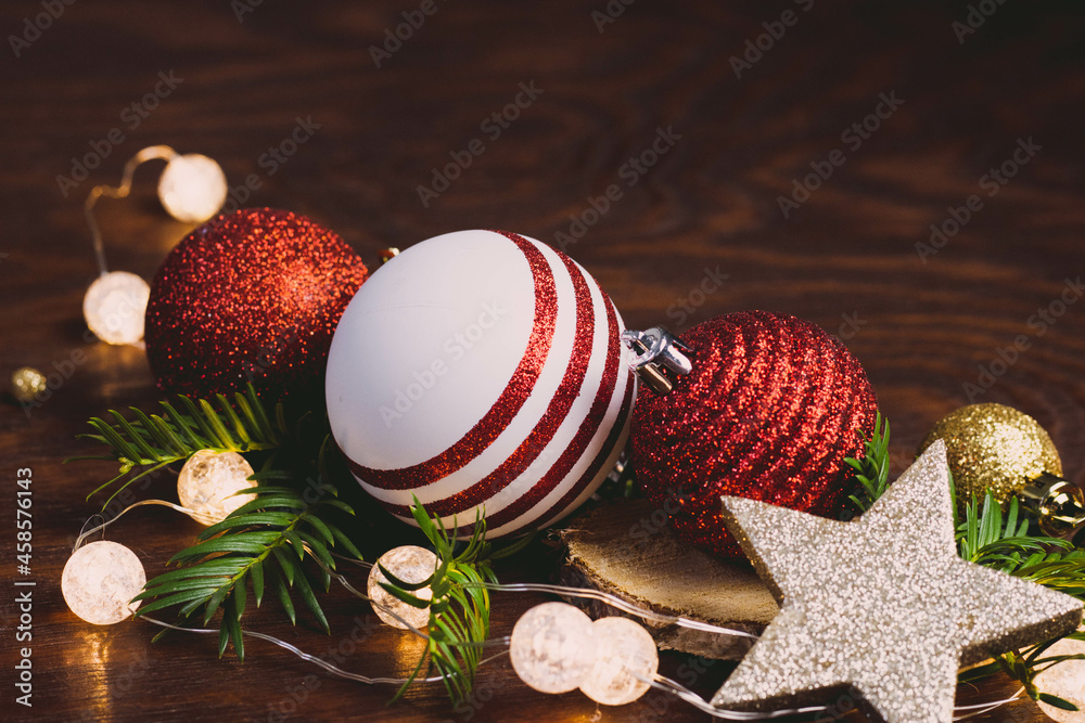 Christmas Bauble Arrangement With Lights On Dark Brown Wood Christmas Bauble Arrangement With Lights On Dark Brown Wood