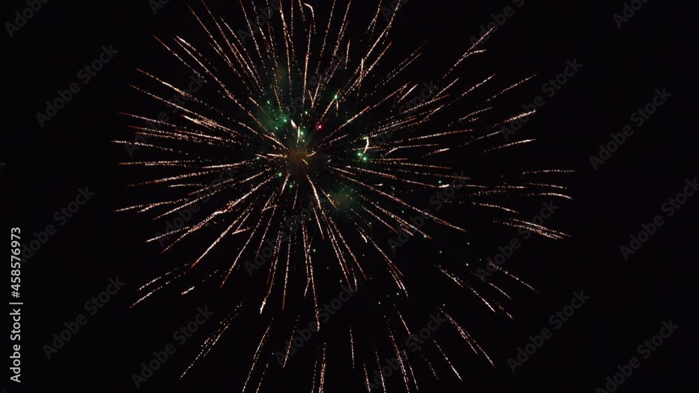 Fireworks. abstract blur of real golden shining fireworks with bokeh lights in the night sky. glowing fireworks. New year fireworks Fireworks. abstract blur of real golden shining fireworks with bokeh lights in the night sky. glowing fireworks. New year fireworks