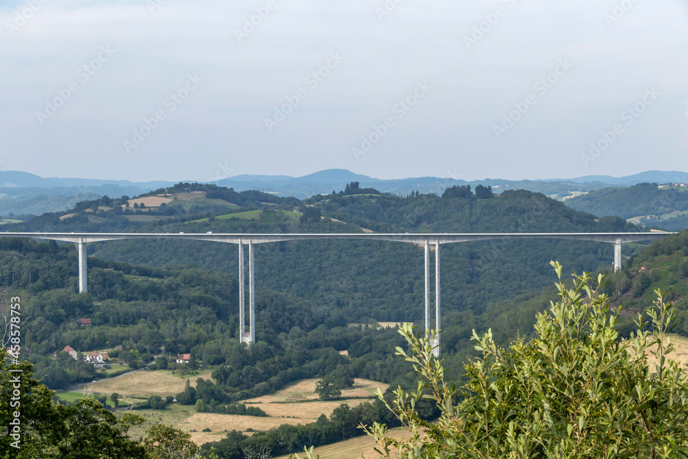Bridge in beautiful valley, typical french countryside with mountains and forest, France, Europe