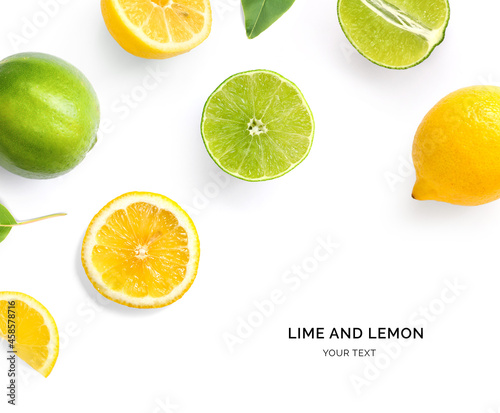 Creative layout made of lemon, lime and leaves. Flat lay. Food concept. Lemon and lime on white background.