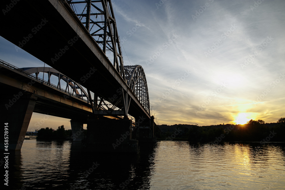 evening landscape of the city against the background of a large river evening landscape of the city against the background of a large river