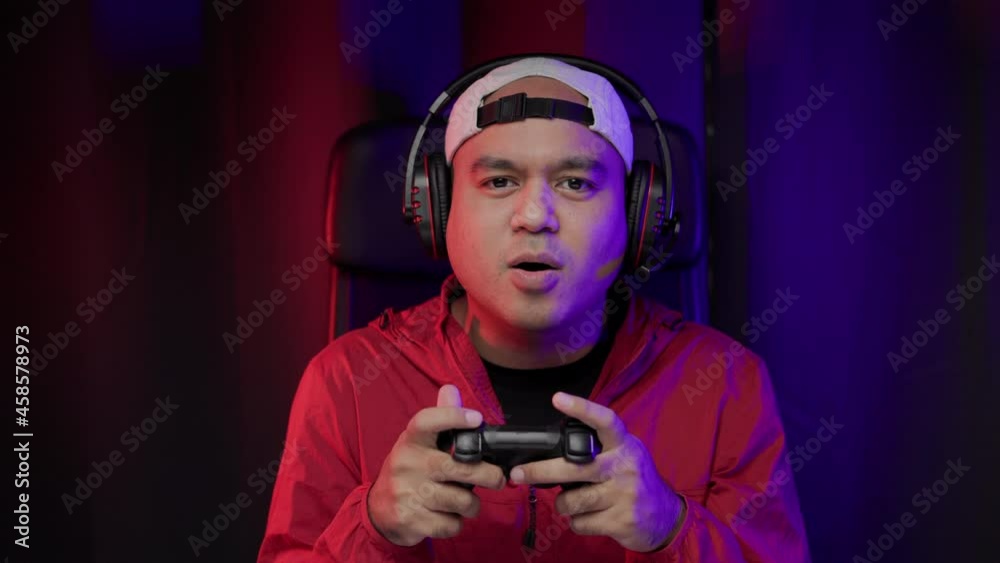 Sadness gamer man play computer pc. He lose in the game. Missed the chance to become a champion in tournament. Young indian playing video game online at home.