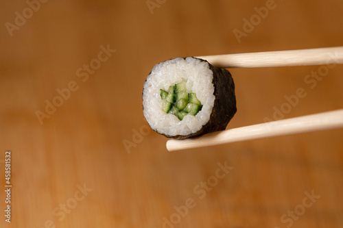 vegan sushi rice roll cucumber kappamaki photo