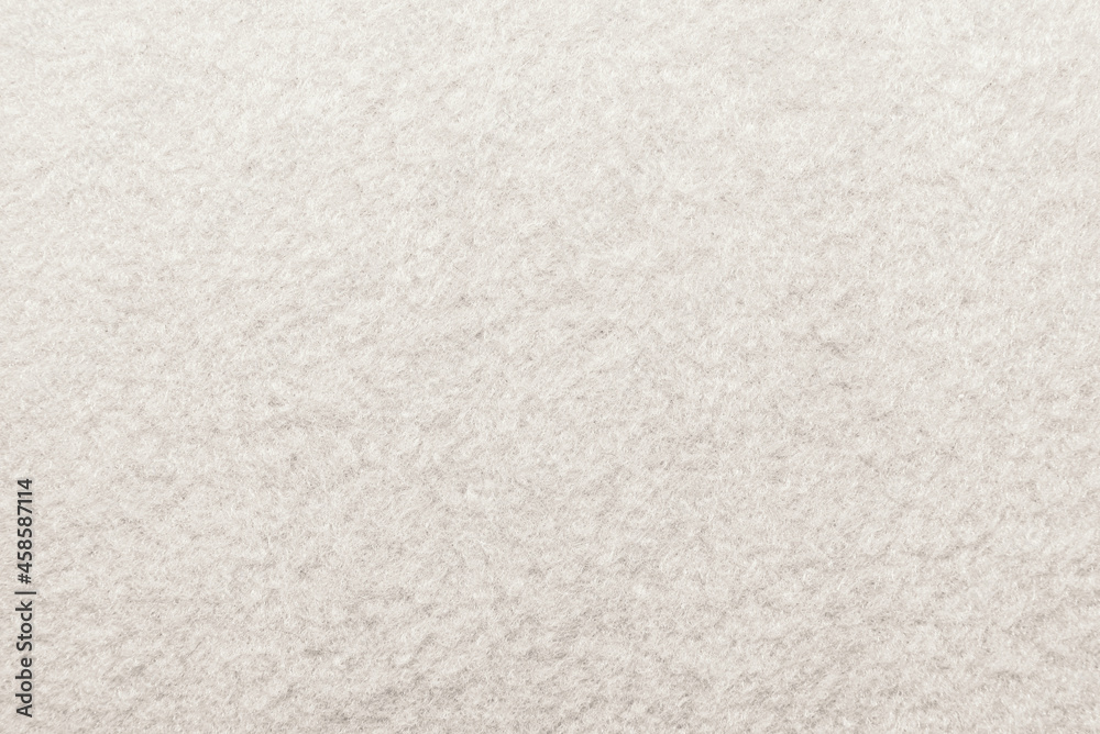White fabric. The texture of the material is light in color. Felt. Carpet White fabric. The texture of the material is light in color. Felt. Carpet